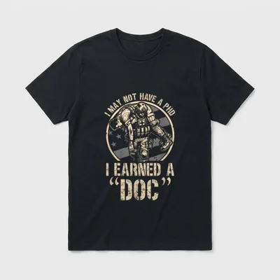 Military Medic T-Shirt – Soldier carrying casualty with text about medic training – Classic T-Shirt in Black