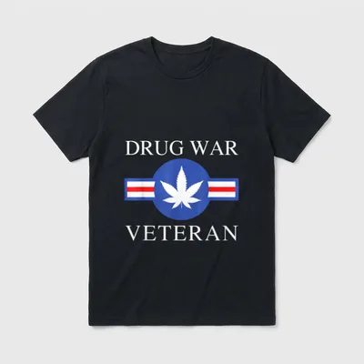 Marijuana Veteran T-Shirt – DRUG WAR VETERAN text with cannabis leaf insignia – Classic T-Shirt in Black