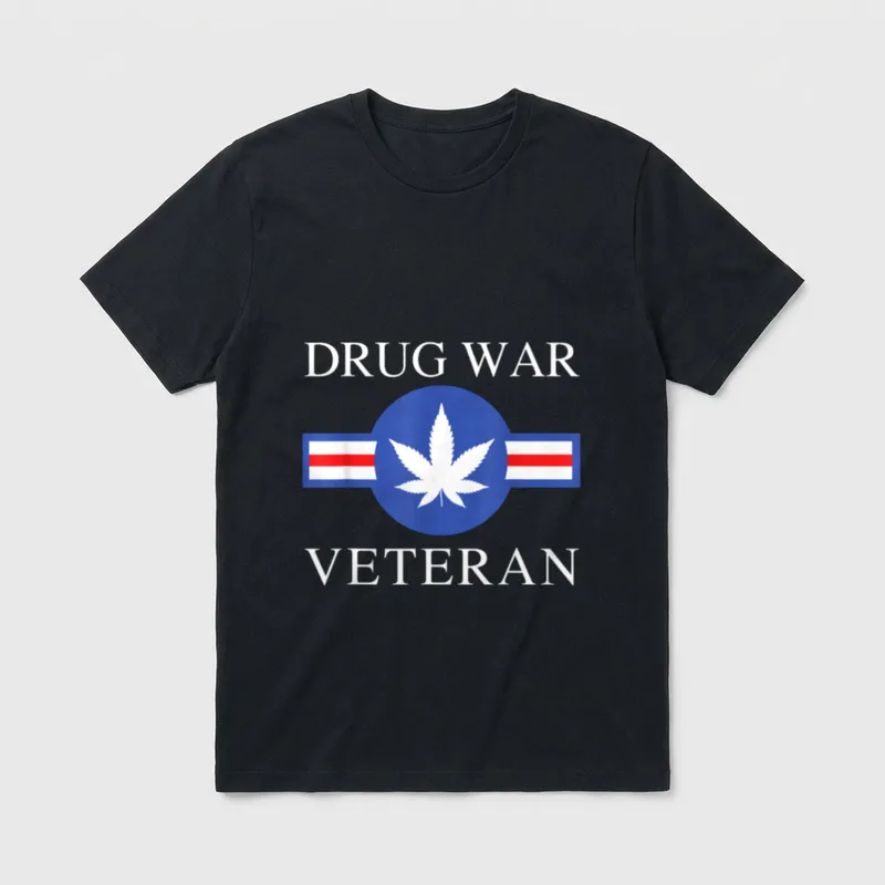 Marijuana Veteran T-Shirt – DRUG WAR VETERAN text with cannabis leaf insignia – Classic T-Shirt in Black