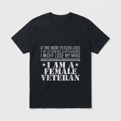 Female Veteran Husband T-Shirt – Bold statement text about a veteran hat and assumptions – Classic T-Shirt in Black