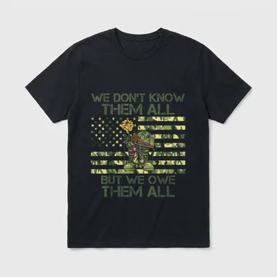 We Owe Them All T-Shirt – We Don't Know Them All But We Owe Them All text with military boots – Classic T-Shirt in Black