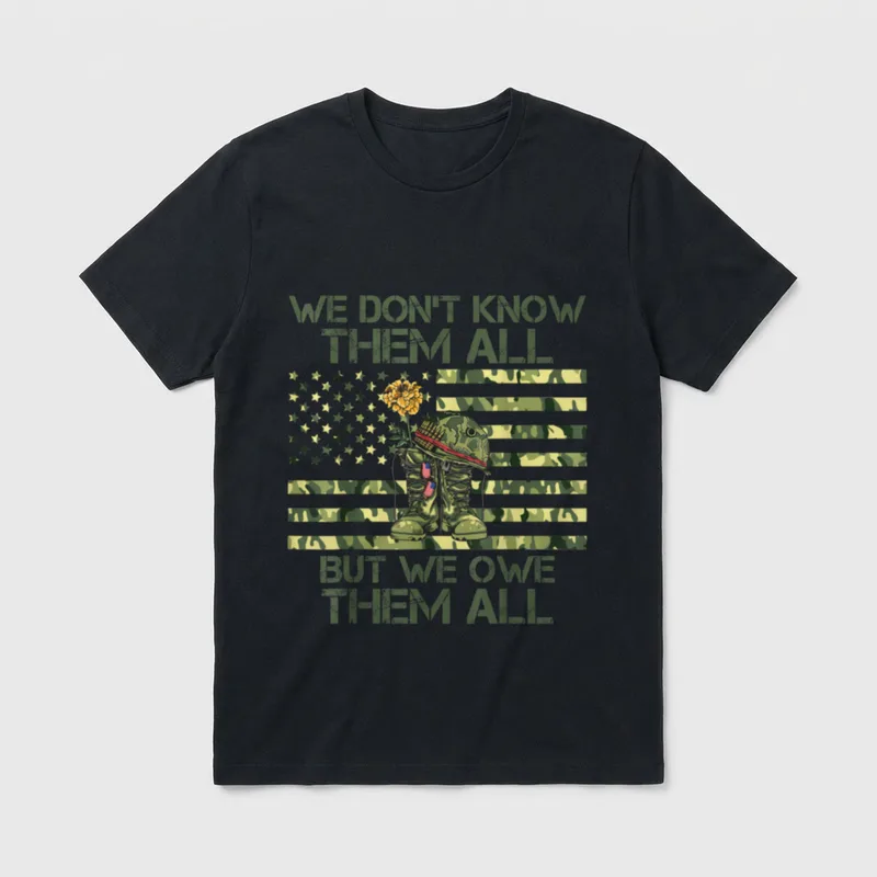 We Owe Them All T-Shirt – We Don't Know Them All But We Owe Them All text with military boots – Classic T-Shirt in Black